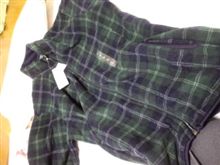 青緑チェック柄の服