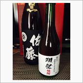 買収？