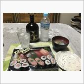 寿司と芋焼酎のコンビがいいね。