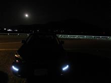 に 