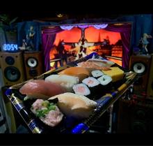 寿司たべてます。