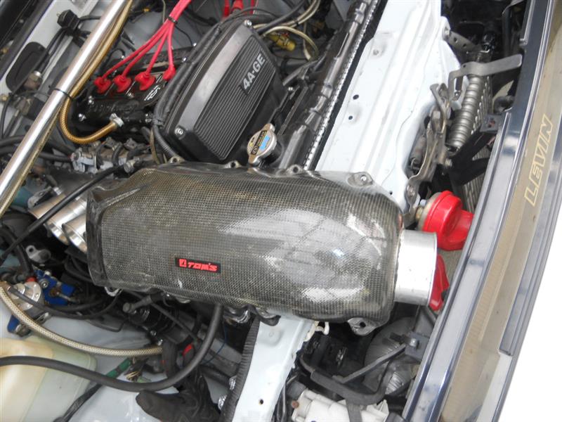 TOM'S AE101 4スロ用カーボンインダクションBOX のパーツ